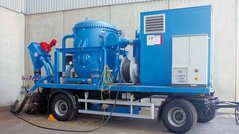 Vacuum cleaning system manufactured by Messrs. IB process technology. A positive displacement blower of Aerzener Maschinenfabrik, located in a sound-insulating housing at the front of the vehicle, produces the necessary negative pressure